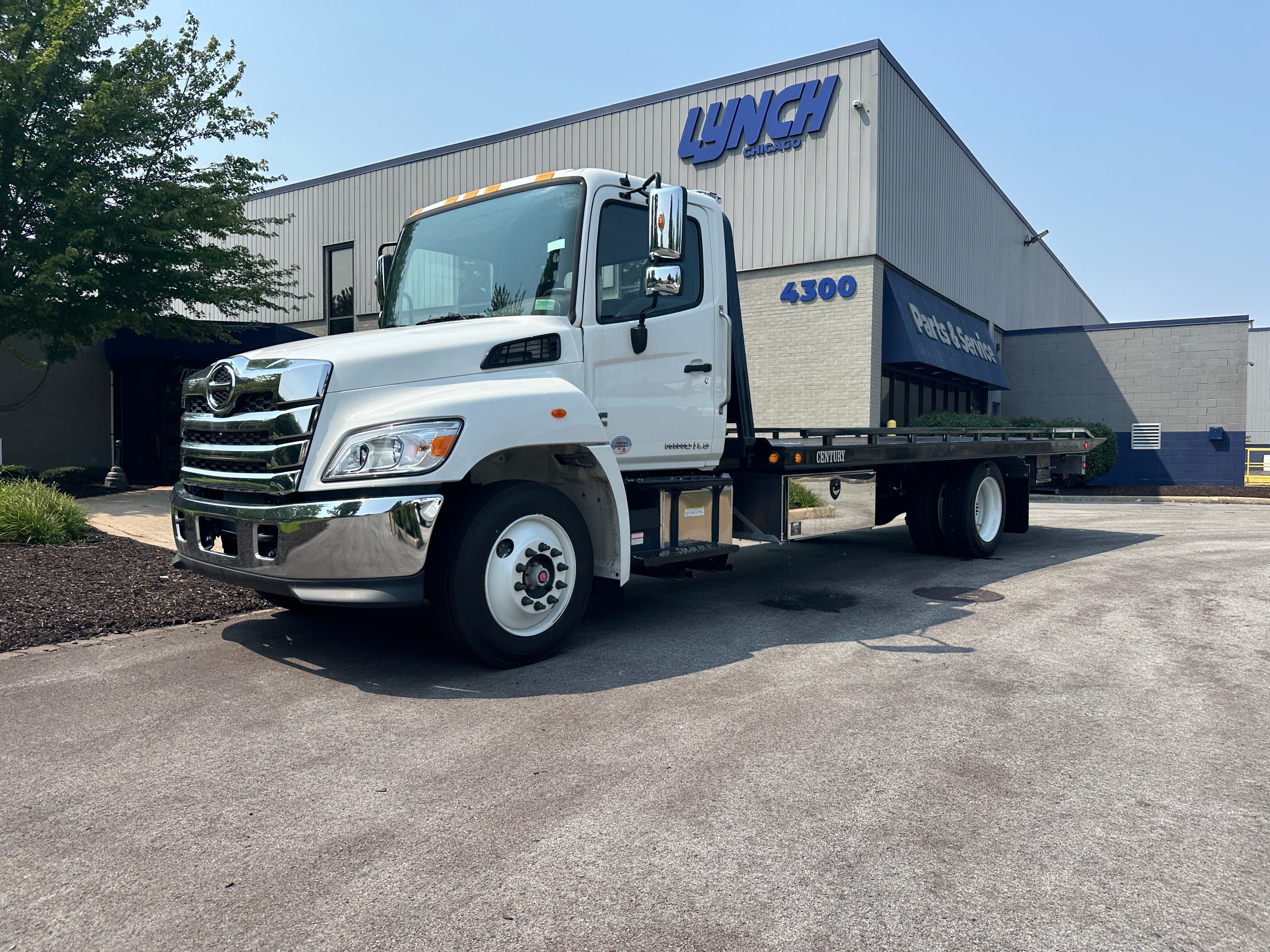 2025 Hino L6 WITH A CENTURY 21.5' STEEL CARRIER  (SK#: 6244C) image 1